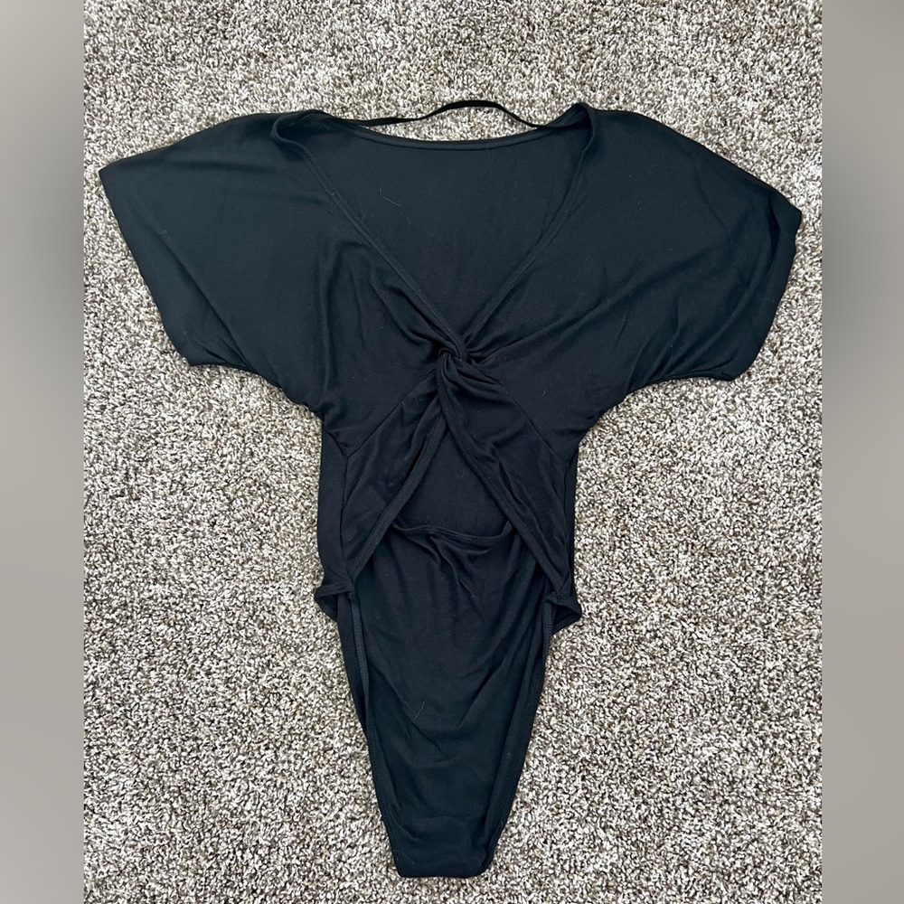 Free People black bodysuit. Size XS. Never used.
